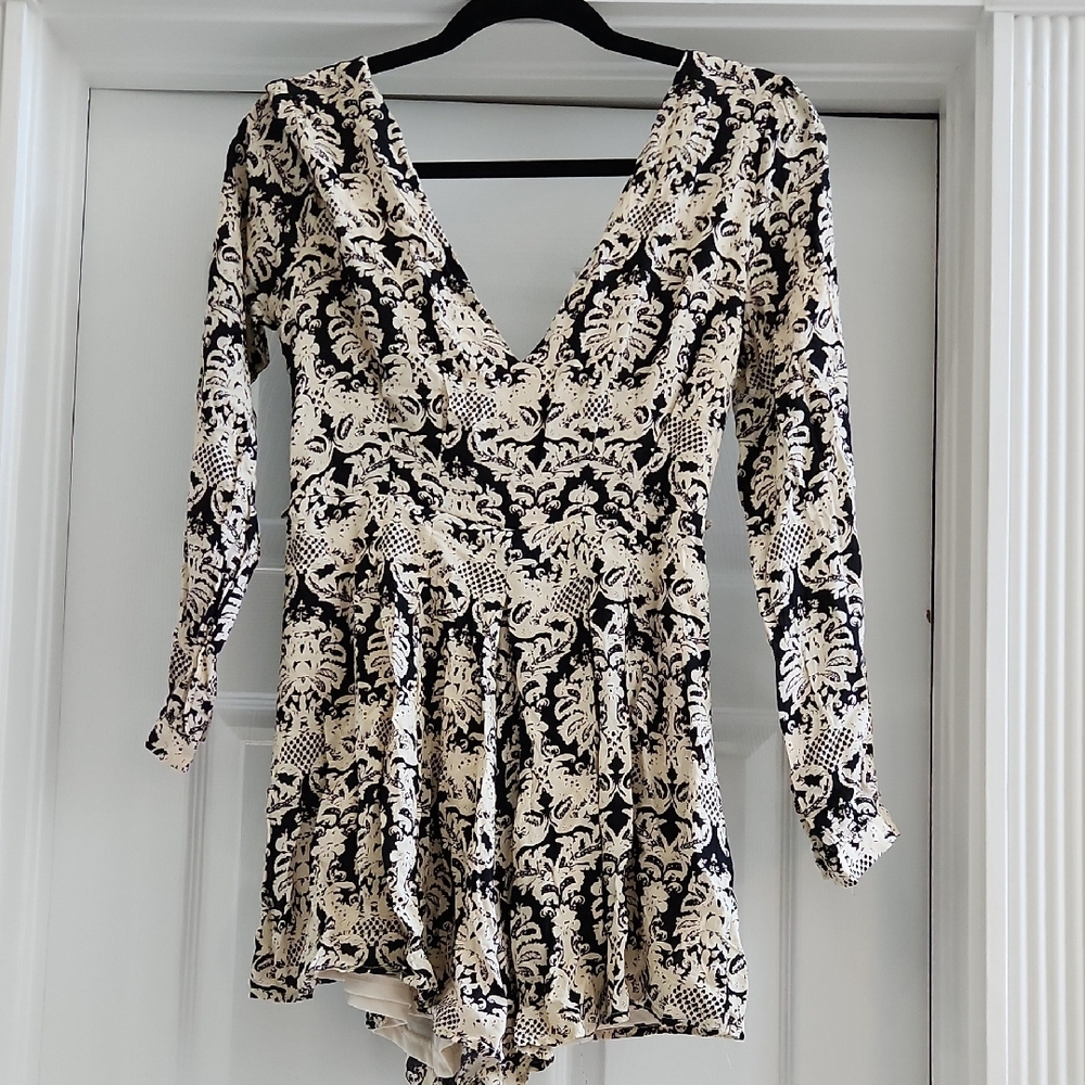 Elegant Black and Cream Patterned Romper